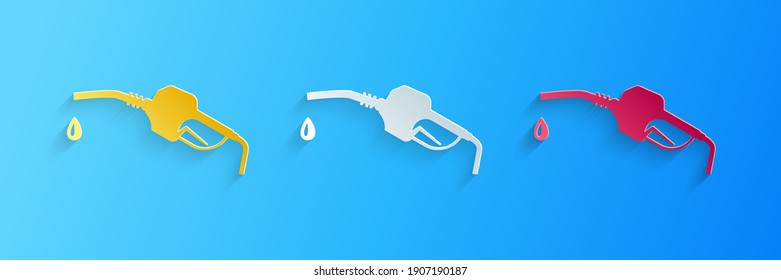 Paper cut Gasoline pump nozzle icon isolated on blue background. Fuel pump petrol station. Refuel service sign. Gas station icon. Paper art style. Vector.