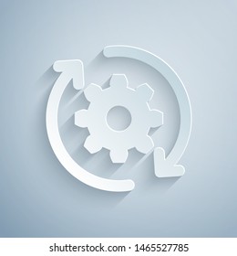 Paper cut Gear and arrows as workflow concept icon isolated on grey background. Gear reload sign. Paper art style. Vector Illustration