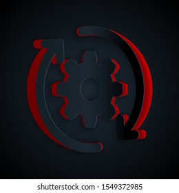 Paper cut Gear and arrows as workflow concept icon isolated on black background. Gear reload sign. Paper art style. Vector Illustration