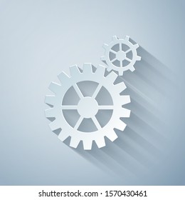 Paper cut Gear icon isolated on grey background. Cogwheel gear settings sign. Cog symbol. Paper art style. Vector Illustration