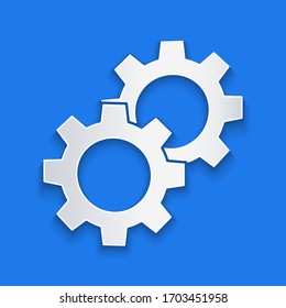 Paper cut Gear icon isolated on blue background. Cogwheel gear settings sign. Cog symbol. Paper art style. Vector Illustration