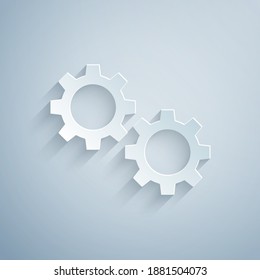 Paper cut Gear icon isolated on grey background. Cogwheel gear settings sign. Cog symbol. Paper art style. Vector.
