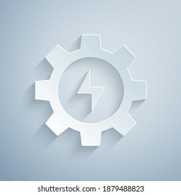 Paper cut Gear and lightning icon isolated on grey background. Electric power. Lightning bolt sign. Paper art style. Vector.