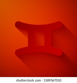 Paper cut Gemini zodiac sign icon isolated on red background. Astrological horoscope collection. Paper art style. Vector Illustration