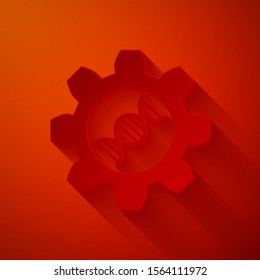 Paper cut Genetic engineering icon isolated on red background. DNA analysis, genetics testing, cloning, paternity testing. Paper art style. Vector Illustration