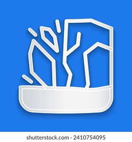 Paper cut Glacier melting icon isolated on blue background. Paper art style. Vector