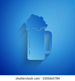 Paper cut Glass of beer icon isolated on blue background. Paper art style. Vector Illustration