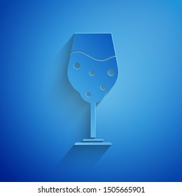 Paper cut Glass of beer icon isolated on blue background. Paper art style. Vector Illustration