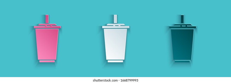 Paper cut Paper glass with drinking straw and water icon isolated on blue background. Soda drink glass. Fresh cold beverage symbol. Paper art style. Vector Illustration