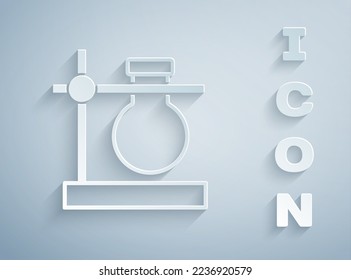 Paper cut Glass test tube flask on stand icon isolated on grey background. Laboratory equipment. Paper art style. Vector