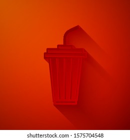 Paper cut Glass with water icon isolated on red background. Soda drink glass with drinking straw. Fresh cold beverage symbol. Paper art style. Vector Illustration