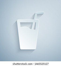 Paper cut Glass with water and tube for drinking icon isolated on grey background. Soda glass. Paper art style. Vector Illustration