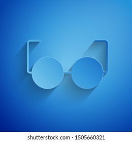 Paper cut Glasses icon isolated on blue background. Eyeglass frame symbol. Paper art style. Vector Illustration