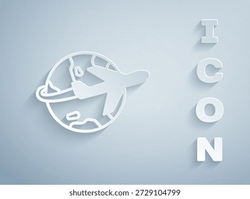 Paper cut Globe with flying plane icon isolated on grey background. Airplane fly around the planet earth. Aircraft world icon. Paper art style. Vector