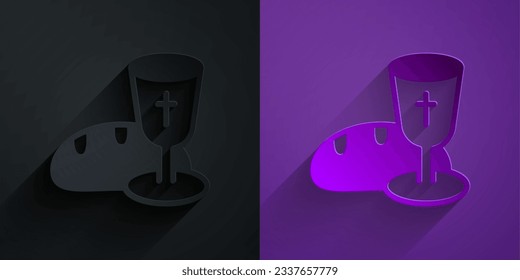 Paper cut Goblet and bread icon isolated on black on purple background. Bread and wine cup. Holy communion sign. Paper art style. Vector