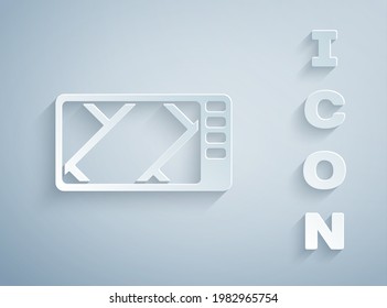 Paper cut Gps device with map icon isolated on grey background. Paper art style. Vector Illustration