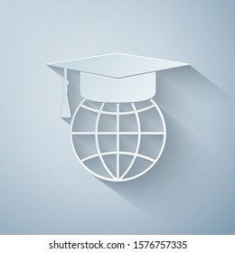 Paper cut Graduation cap on globe icon isolated on grey background. World education symbol. Online learning or e-learning concept. Paper art style. Vector Illustration