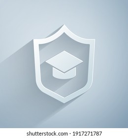 Paper cut Graduation cap with shield icon isolated on grey background. Insurance concept. Security, safety, protection, protect concept. Paper art style. Vector