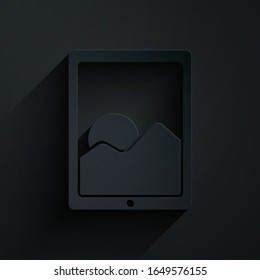 Paper cut Graphic tablet icon isolated on black background. Paper art style. Vector Illustration