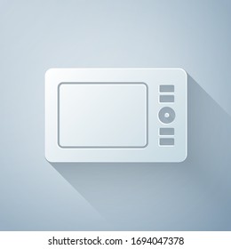 Paper cut Graphic tablet icon isolated on grey background. Paper art style. Vector Illustration