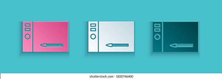 Paper cut Graphic tablet icon isolated on blue background. Paper art style. Vector Illustration