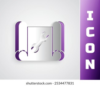 Paper cut Graphing paper for engineering and wrench icon isolated on grey background. Paper art style. Vector