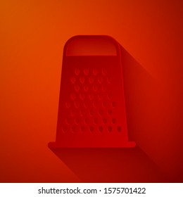 Paper cut Grater icon isolated on red background. Kitchen symbol. Cooking utensil. Cutlery sign. Paper art style. Vector Illustration
