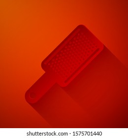 Paper cut Grater icon isolated on red background. Kitchen symbol. Cooking utensil. Cutlery sign. Paper art style. Vector Illustration