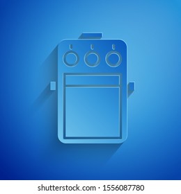 Paper cut Guitar pedal icon isolated on blue background. Musical equipment. Paper art style. Vector Illustration