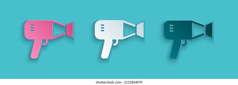 Paper cut Hair dryer icon isolated on blue background. Hairdryer sign.  Blowing hot air. Paper art style. Vector