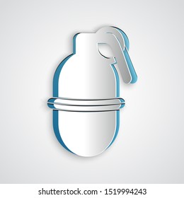 Paper cut Hand grenade icon isolated on grey background. Bomb explosion. Paper art style. Vector Illustration