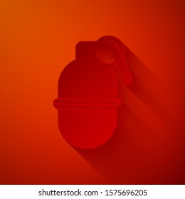 Paper cut Hand grenade icon isolated on red background. Bomb explosion. Paper art style. Vector Illustration