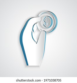 Paper cut Hand holding coin money icon isolated on grey background. Dollar or USD symbol. Cash Banking currency sign. Paper art style. Vector Illustration