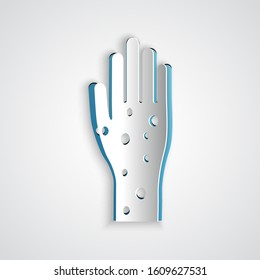 Paper cut Hand with psoriasis or eczema icon isolated on grey background. Concept of human skin response to allergen or chronic body problem. Paper art style. Vector Illustration