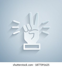 Paper Cut Hand Showing Two Finger Icon Isolated On Grey Background. Victory Hand Sign. Paper Art Style. Vector.
