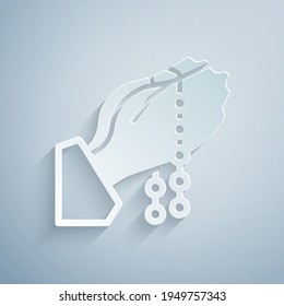 Paper cut Hands in praying position with rosary icon isolated on grey background. Praying hand islam muslim religion spirituality religious. Paper art style. Vector