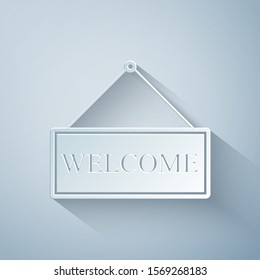 Paper cut Hanging sign with text Welcome icon isolated on grey background. Business theme for cafe or restaurant. Paper art style. Vector Illustration