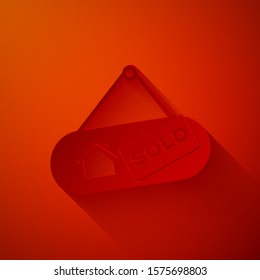 Paper cut Hanging sign with text Sold icon isolated on red background. Sold sticker. Sold signboard. Paper art style. Vector Illustration