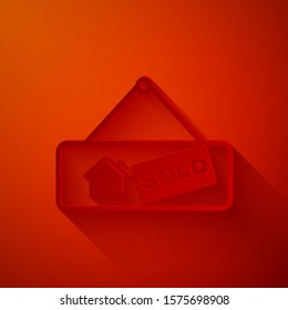 Paper cut Hanging sign with text Sold icon isolated on red background. Sold sticker. Sold signboard. Paper art style. Vector Illustration