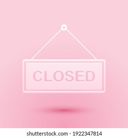 Paper cut Hanging sign with text Closed door icon isolated on pink background. Paper art style. Vector.