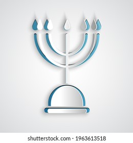 Paper cut Hanukkah menorah icon isolated on grey background. Hanukkah traditional symbol. Holiday religion, jewish festival of Lights. Paper art style. Vector Illustration