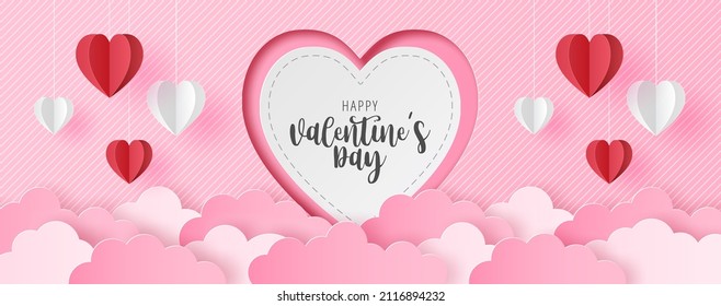 Paper cut of Happy Valentine's Day text on white heart with origami paper heart shape on pastel color background for greeting card, banner, poster, headers website