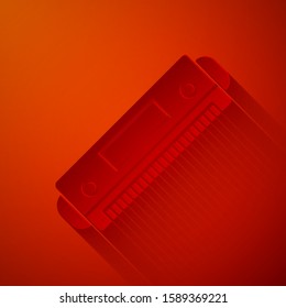 Paper cut Harmonica icon isolated on red background. Musical instrument. Paper art style. Vector Illustration