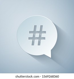 Paper cut Hashtag in circle icon isolated on grey background. Social media symbol, concept of number sign, social media, micro blogging pr popularity. Paper art style. Vector Illustration