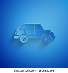 Paper cut Hatchback car icon isolated on blue background. Paper art style. Vector Illustration