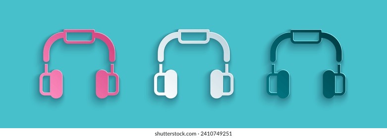 Paper cut Headphones icon isolated on blue background. Earphones. Concept for listening to music, service, communication and operator. Paper art style. Vector