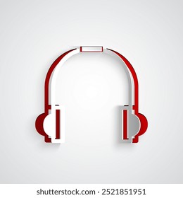 Icono de auriculares de corte de papel aislado sobre fondo gris. Auriculares. Concepto para escuchar música, servicio, comunicación y operador. Estilo de arte de papel. Ilustración vectorial