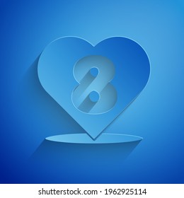 Paper cut Heart with 8 March icon isolated on blue background. Romantic symbol linked, join, passion and wedding. Happy Women Day. Paper art style. Vector Illustration