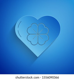 Paper cut Heart with four leaf clover icon isolated on blue background. Happy Saint Patrick day. Paper art style. Vector Illustration