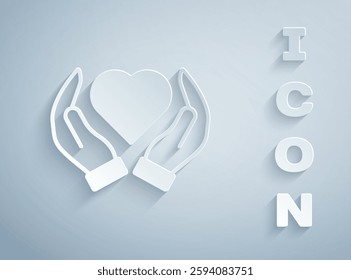 Paper cut Heart in hand icon isolated on grey background. Hand giving love symbol. Valentines day symbol. Paper art style. Vector